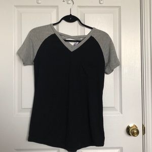 Black and grey t shirt size xs with front pocket